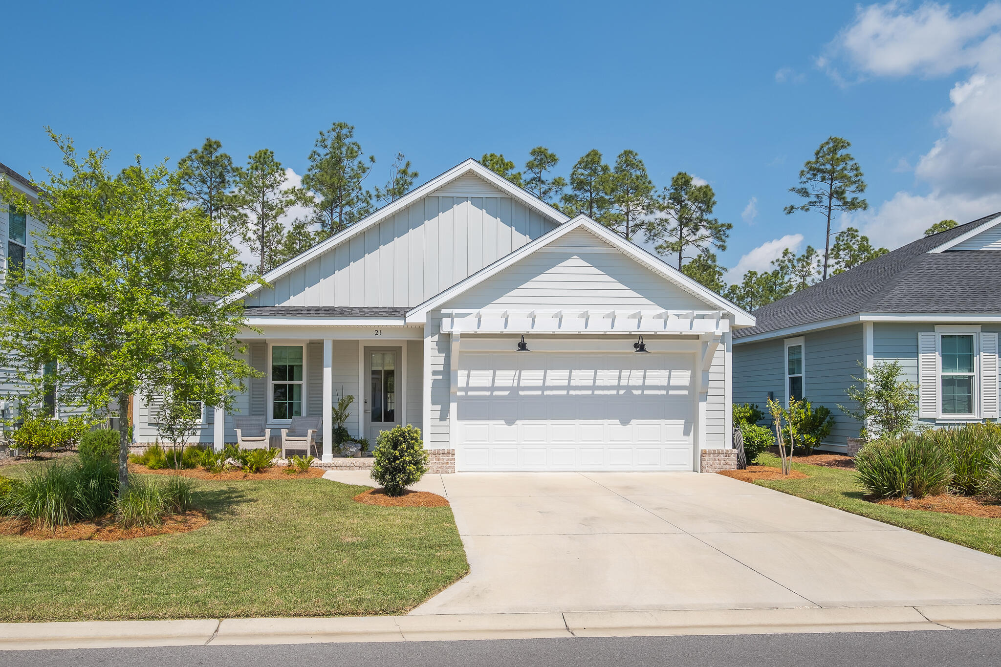 21 Windrow Way Rosemary Beach, FL 32461 - Photo 27 of 38 a view of a house with a yard and potted plants