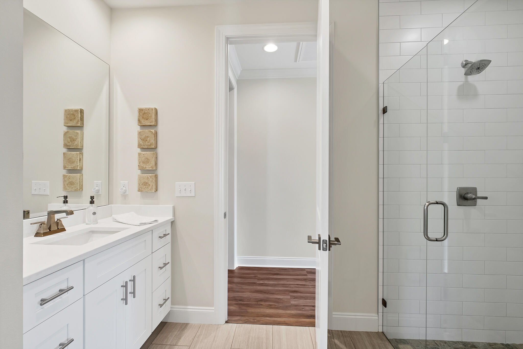 21 Windrow Way Rosemary Beach, FL 32461 - Photo 6 of 38 a bathroom with a sink a mirror and a shower
