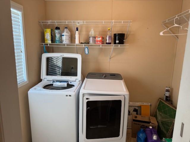3 Gardenia Lane Davie, FL 33325 - Photo 7 of 17 a utility room with dryer and washer