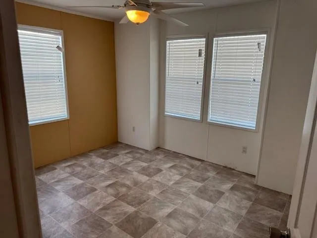 a view of an empty room with window