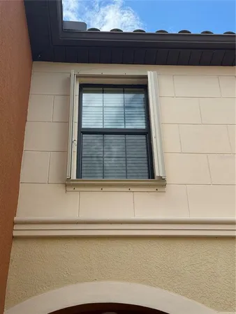 a bathroom with a bathtub and window