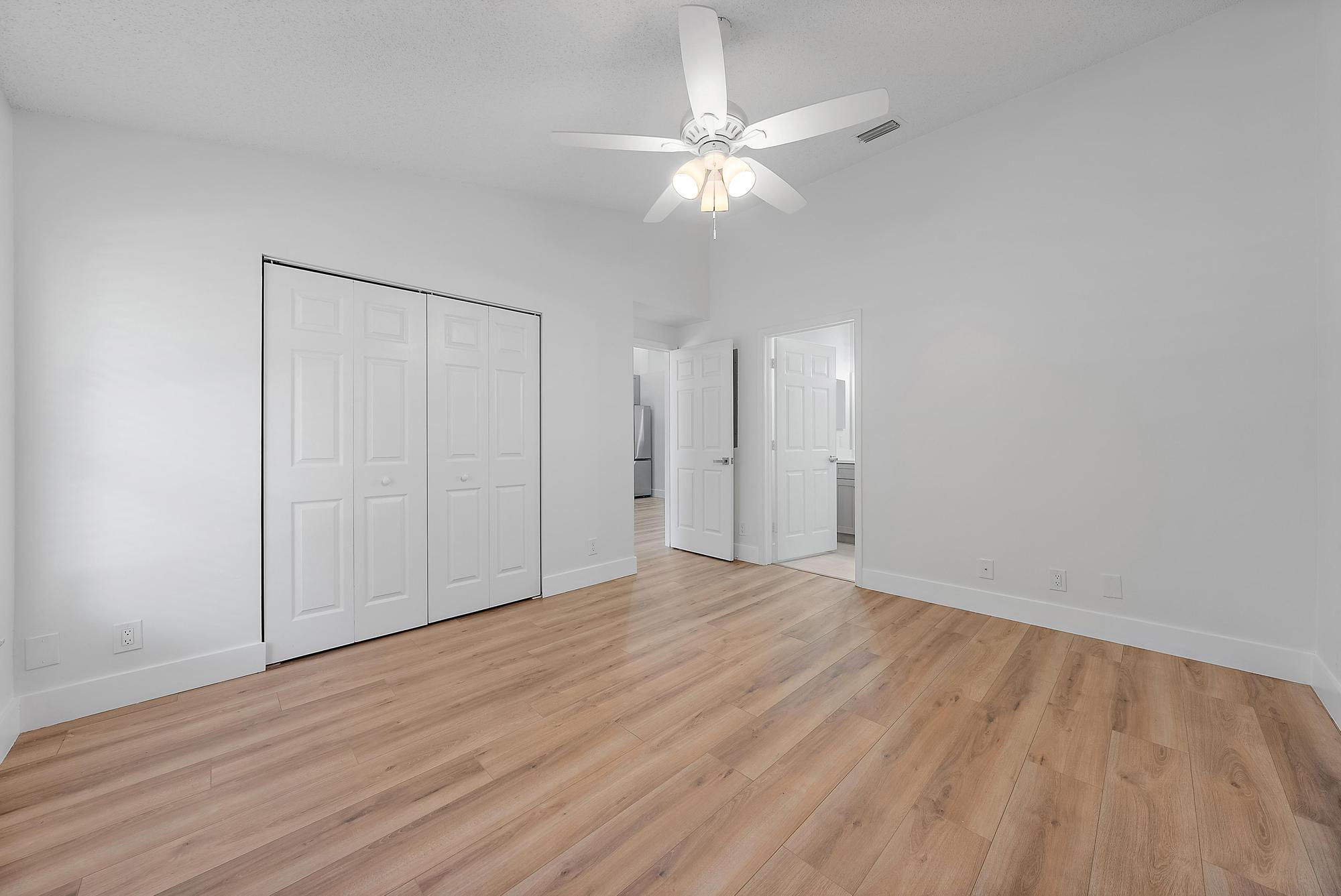 1839 Service Road North Palm Beach, FL 33408 - Photo 8 of 13 Primary Bedroom