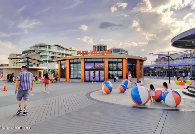 a view of a swimming pool with a sitting space