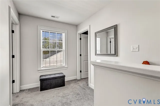 a room with furniture and windows