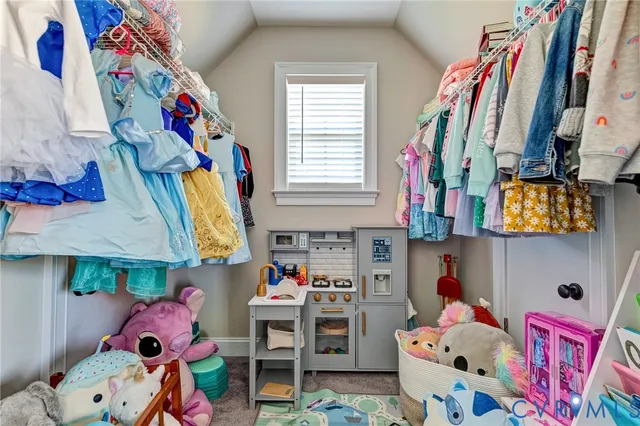a baby bed sitting in a room with baby crib