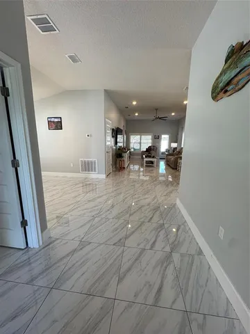 a view of an empty room and window