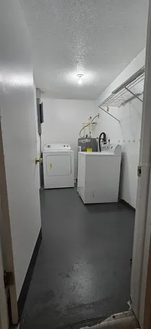 a view of a room with rack and stairs