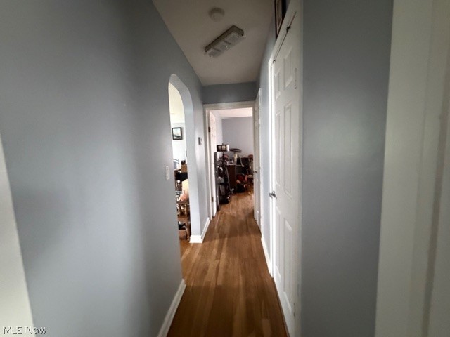 35180 Solon Road Solon, OH 44139 - Photo 17 of 33 Hall featuring arched walkways and dark wood-style floors