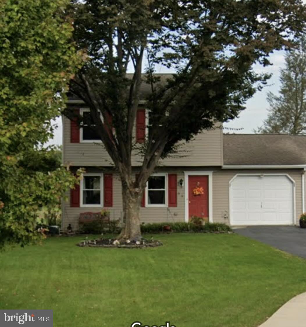 front view of house with a yard