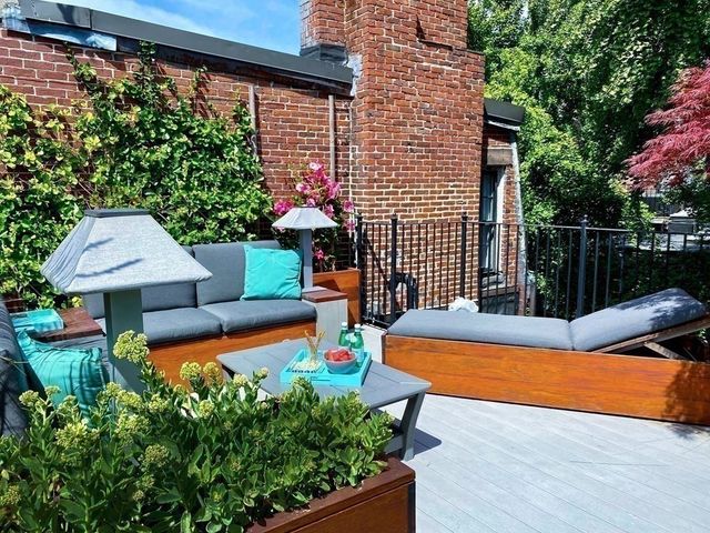 a view of a swimming pool with a lounge chairs