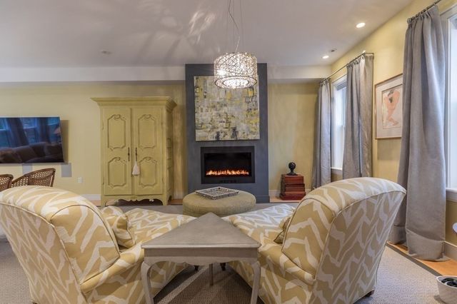 a bedroom with bed and a window