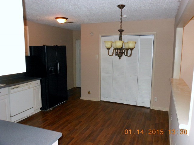 118 Timberline Road Jackson, GA 30233 - Photo 3 of 12 a view of a kitchen with a refrigerator and window