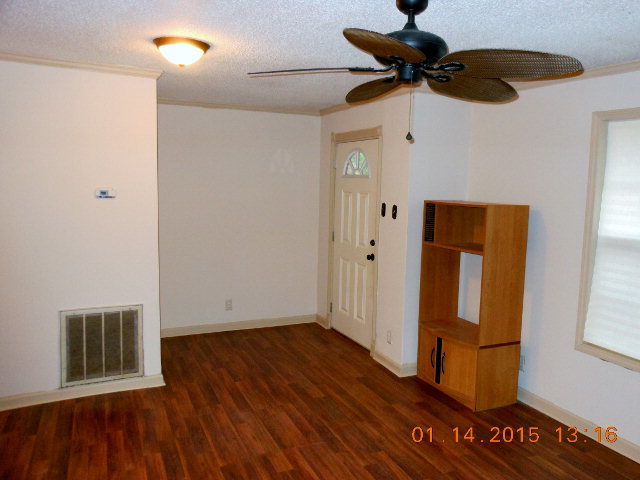 118 Timberline Road Jackson, GA 30233 - Photo 8 of 12 a view of empty room with wooden floor