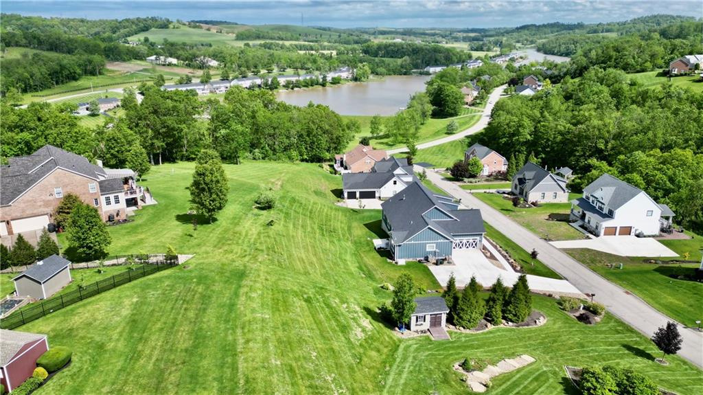 Lot #39 Sunrise Lane McDonald, PA 15057 - Photo 3 of 13 a aerial view of a house with yard lake and green space