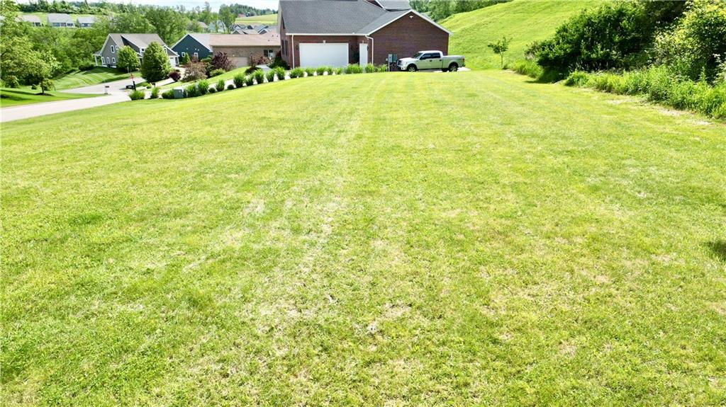 Lot #39 Sunrise Lane McDonald, PA 15057 - Photo 5 of 13 a swimming pool with trees in front of it
