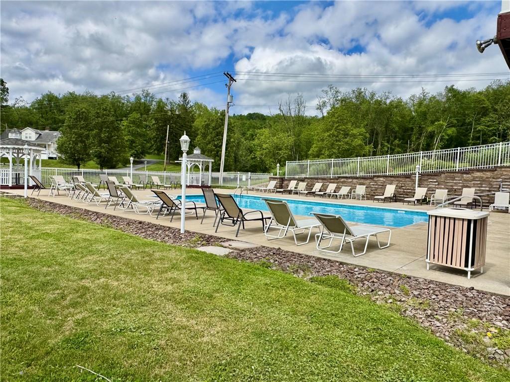 Lot #39 Sunrise Lane McDonald, PA 15057 - Photo 8 of 13 a view of a swimming pool with outdoor seating