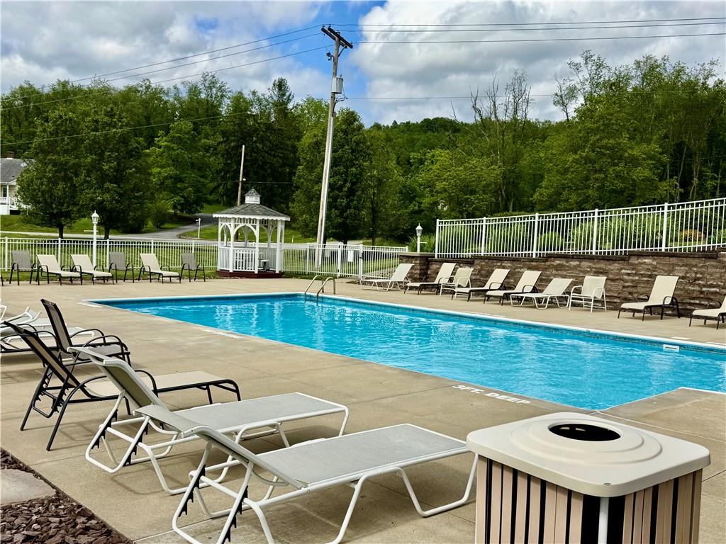 Lot #39 Sunrise Lane McDonald, PA 15057 - Photo 9 of 13 a view of a swimming pool with a lounge chair