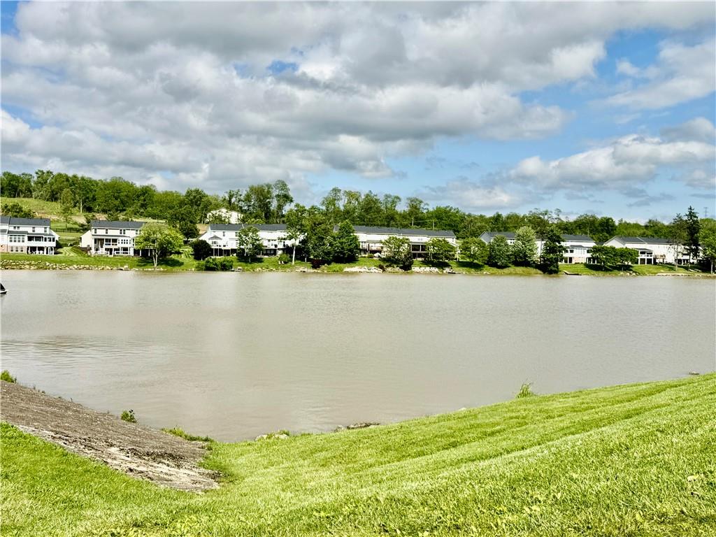 Lot #39 Sunrise Lane McDonald, PA 15057 - Photo 10 of 13 a view of a lake with houses in the back