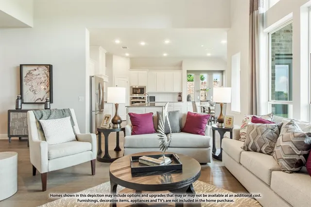 a kitchen with stainless steel appliances granite countertop a sink a stove and cabinets
