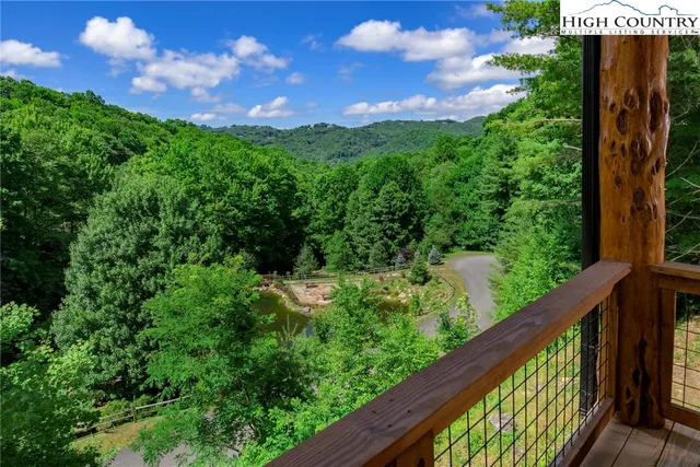 a view of a garden from a balcony