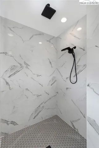 a view of deck with wooden floor and outdoor seating