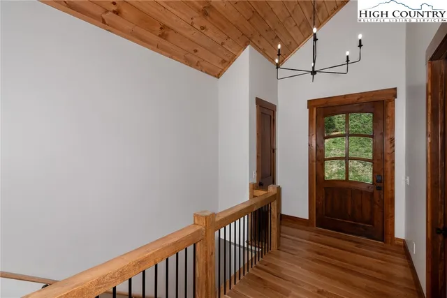 a view of entryway with wooden floor
