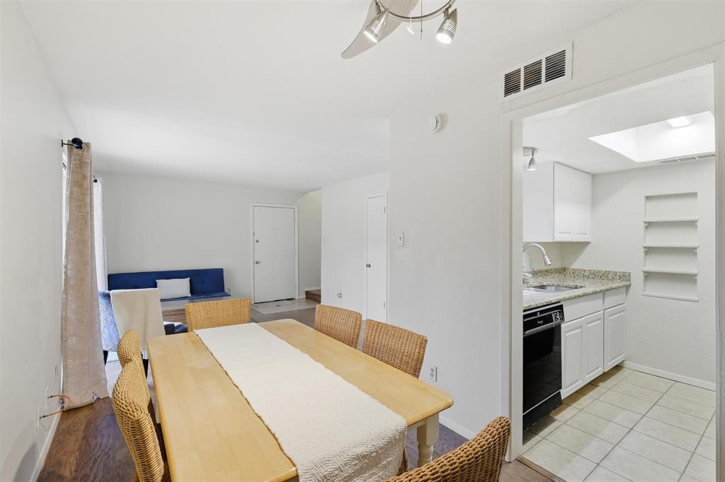 12818 Midway Road, Unit 2078 Dallas, TX 75244 - Photo 13 of 26 a bed room with a stove and a kitchen