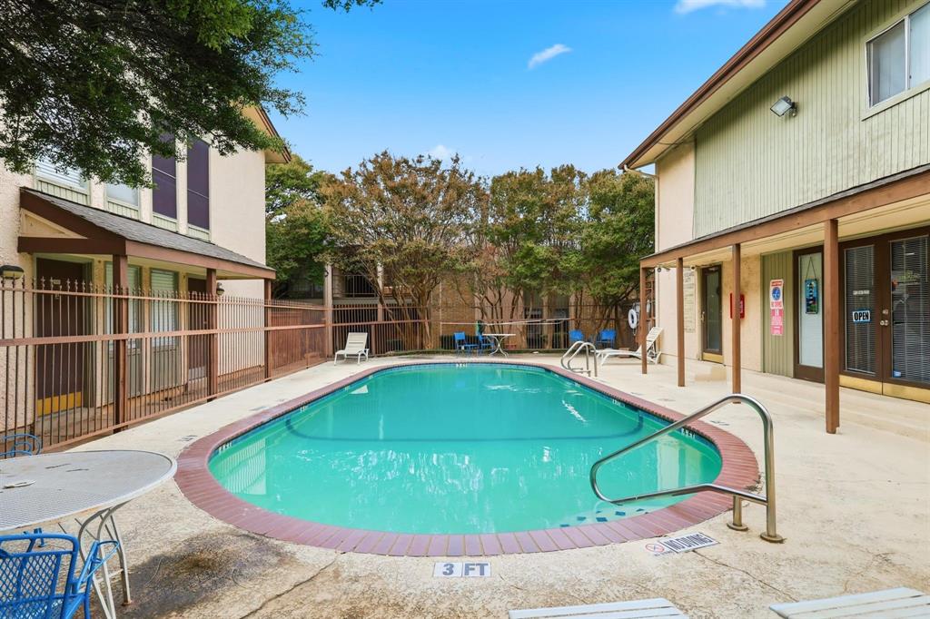 12818 Midway Road, Unit 2078 Dallas, TX 75244 - Photo 25 of 26 a swimming pool with outdoor seating and yard