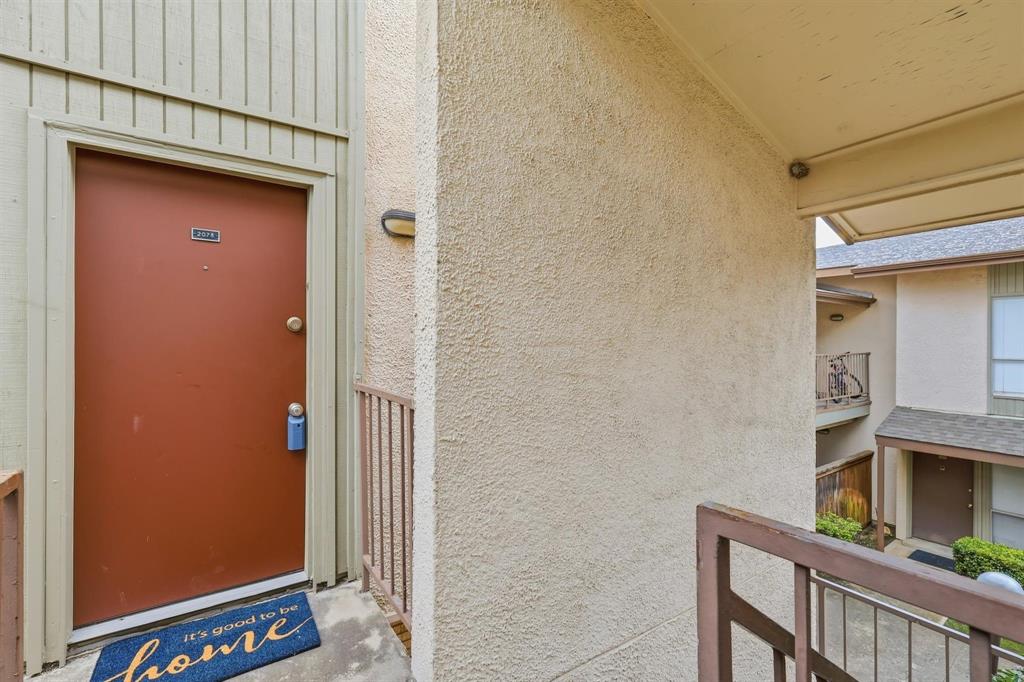 12818 Midway Road, Unit 2078 Dallas, TX 75244 - Photo 7 of 26 a view of front door