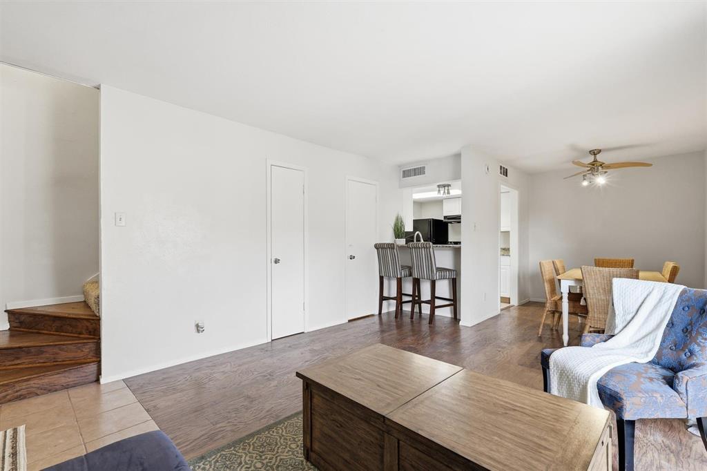 12818 Midway Road, Unit 2078 Dallas, TX 75244 - Photo 8 of 26 a view of a dining room with furniture