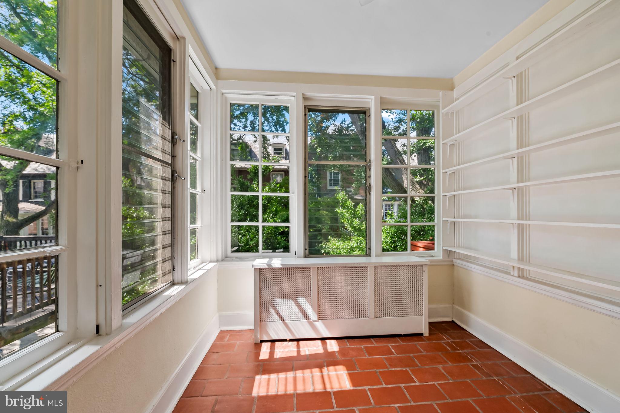 3916 Cloverhill Road Baltimore, MD 21218 - Photo 18 of 47 a view of an empty room with a window