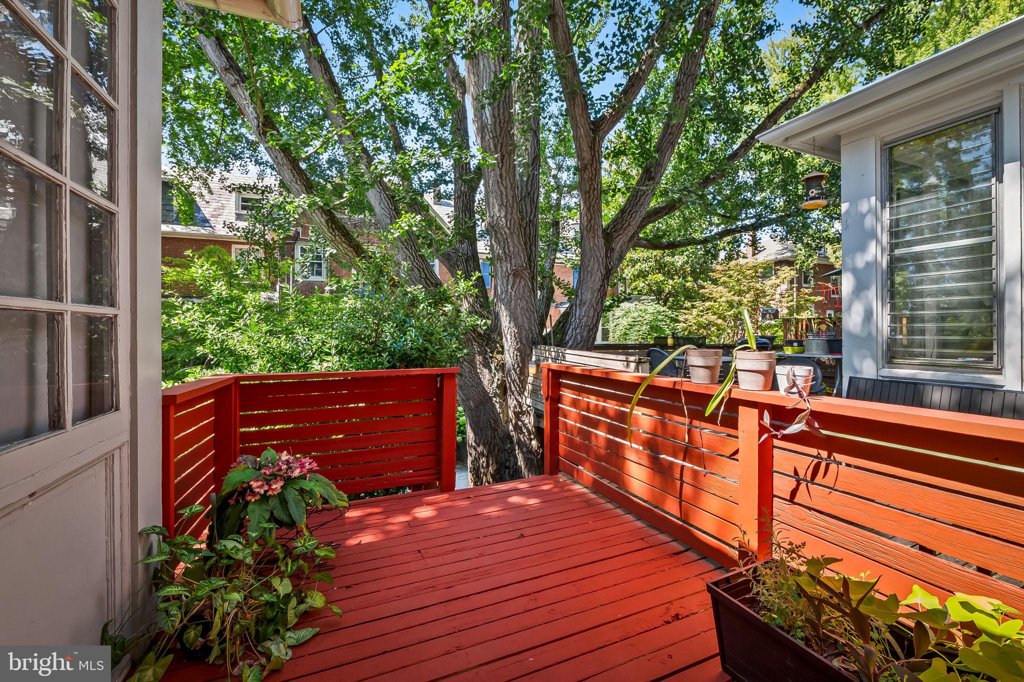 3916 Cloverhill Road Baltimore, MD 21218 - Photo 40 of 47 a view of a wooden deck with a bench