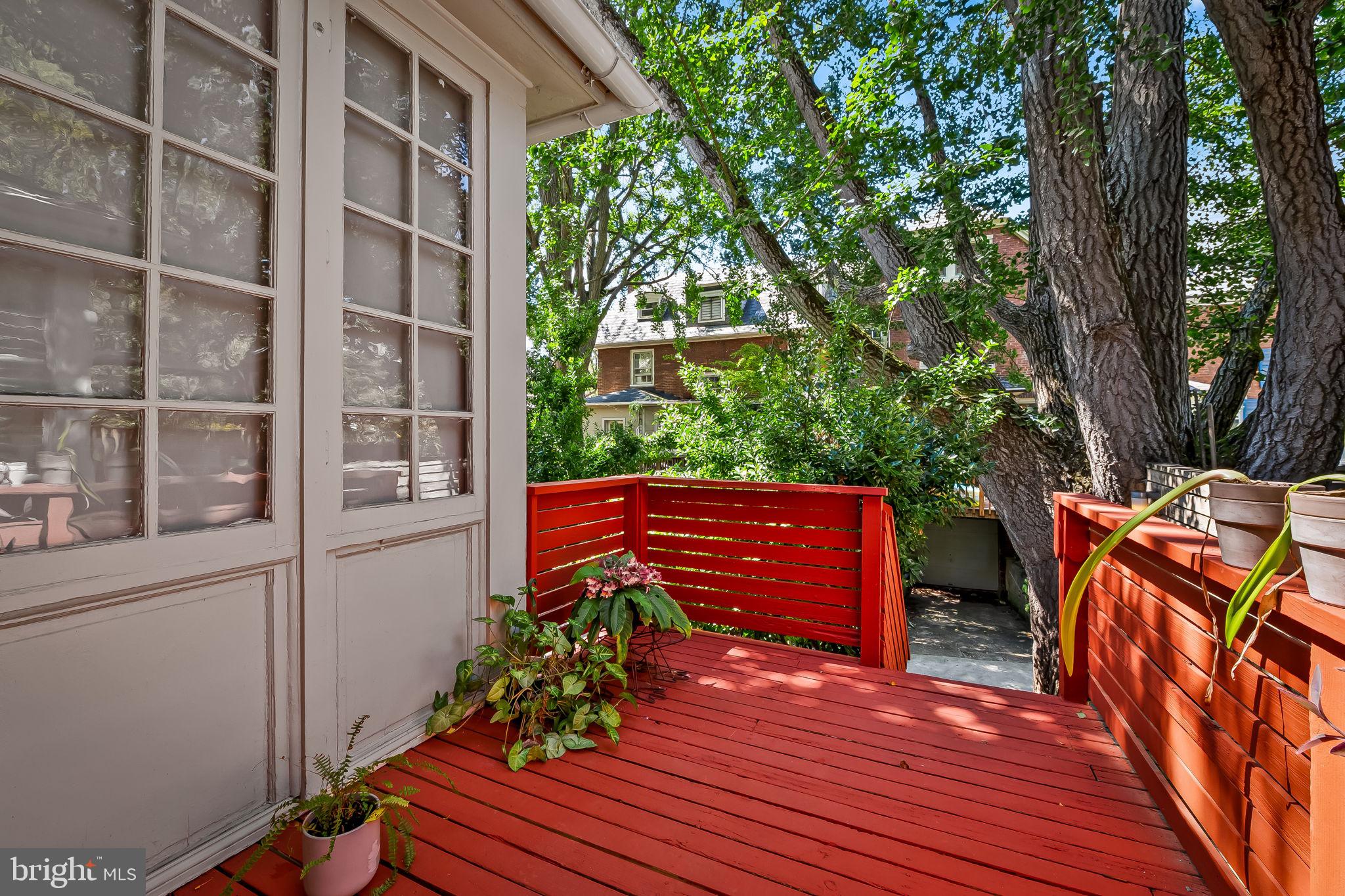 3916 Cloverhill Road Baltimore, MD 21218 - Photo 41 of 47 a balcony with wooden floor