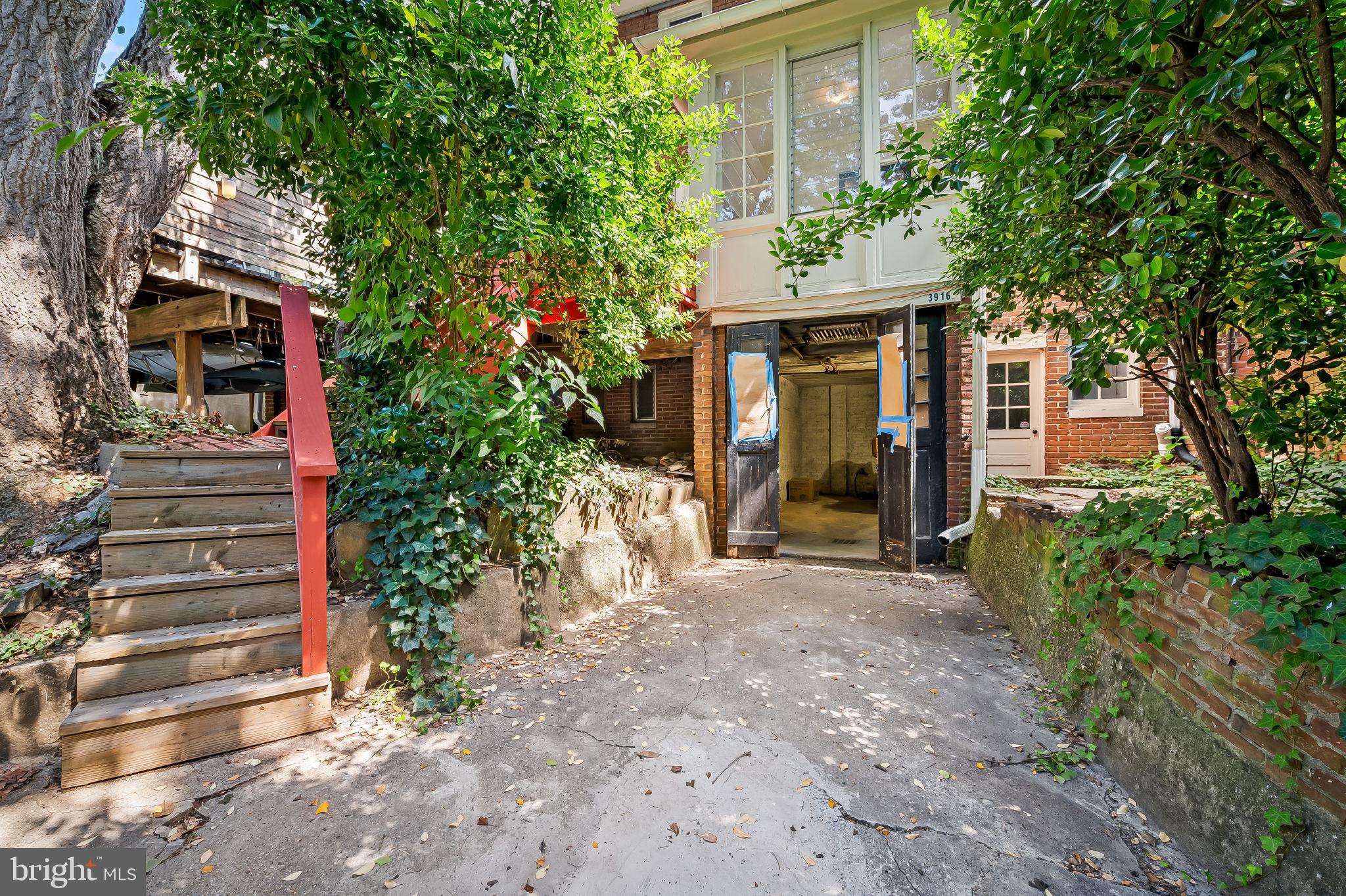 3916 Cloverhill Road Baltimore, MD 21218 - Photo 46 of 47 front view of a house with a yard