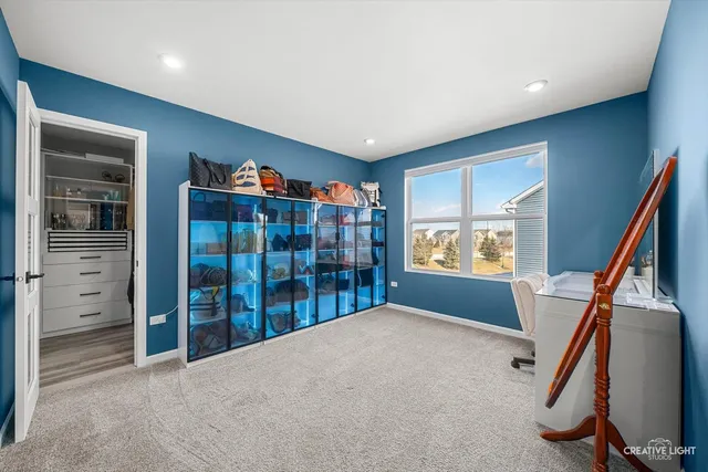 an aerial view of a house with a city view