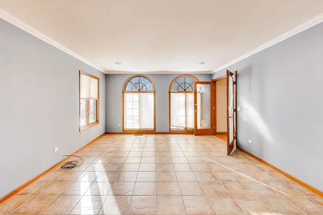 a kitchen with stainless steel appliances granite countertop a sink and cabinets with wooden floor
