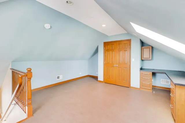 a view of residential houses with yard