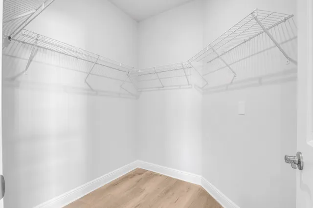 a view of a room with racks on the wall