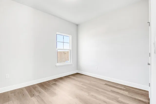 an empty room with a window