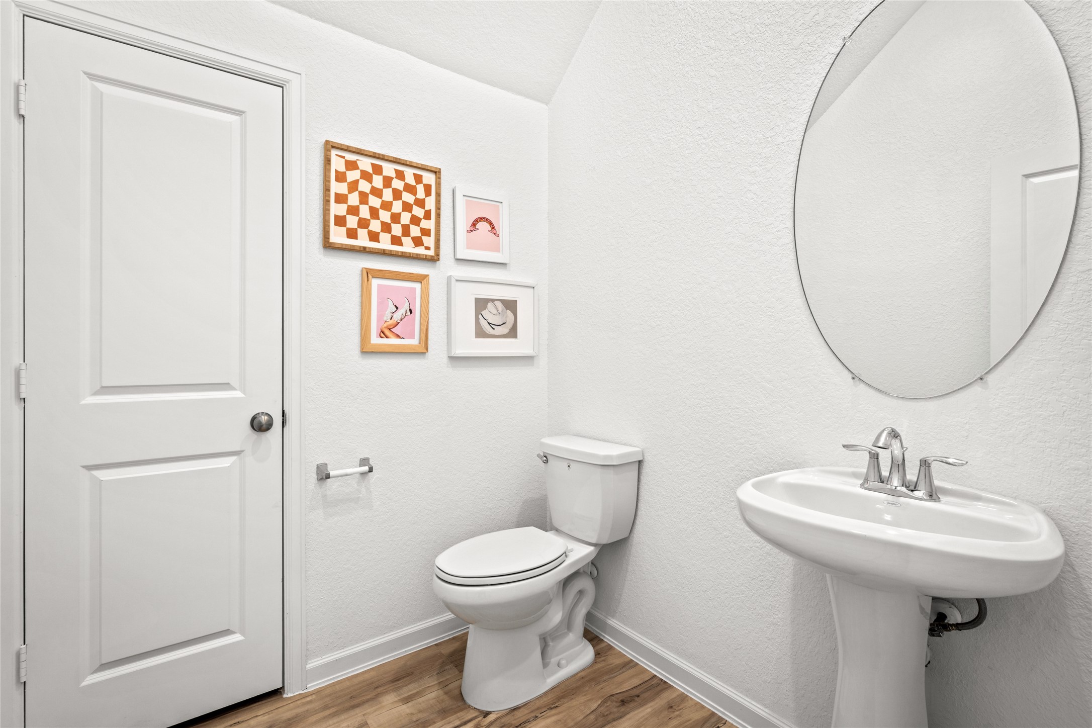 575 Dry Fork Lane Conroe, TX 77304 - Photo 22 of 34 a bathroom with a toilet sink and a mirror