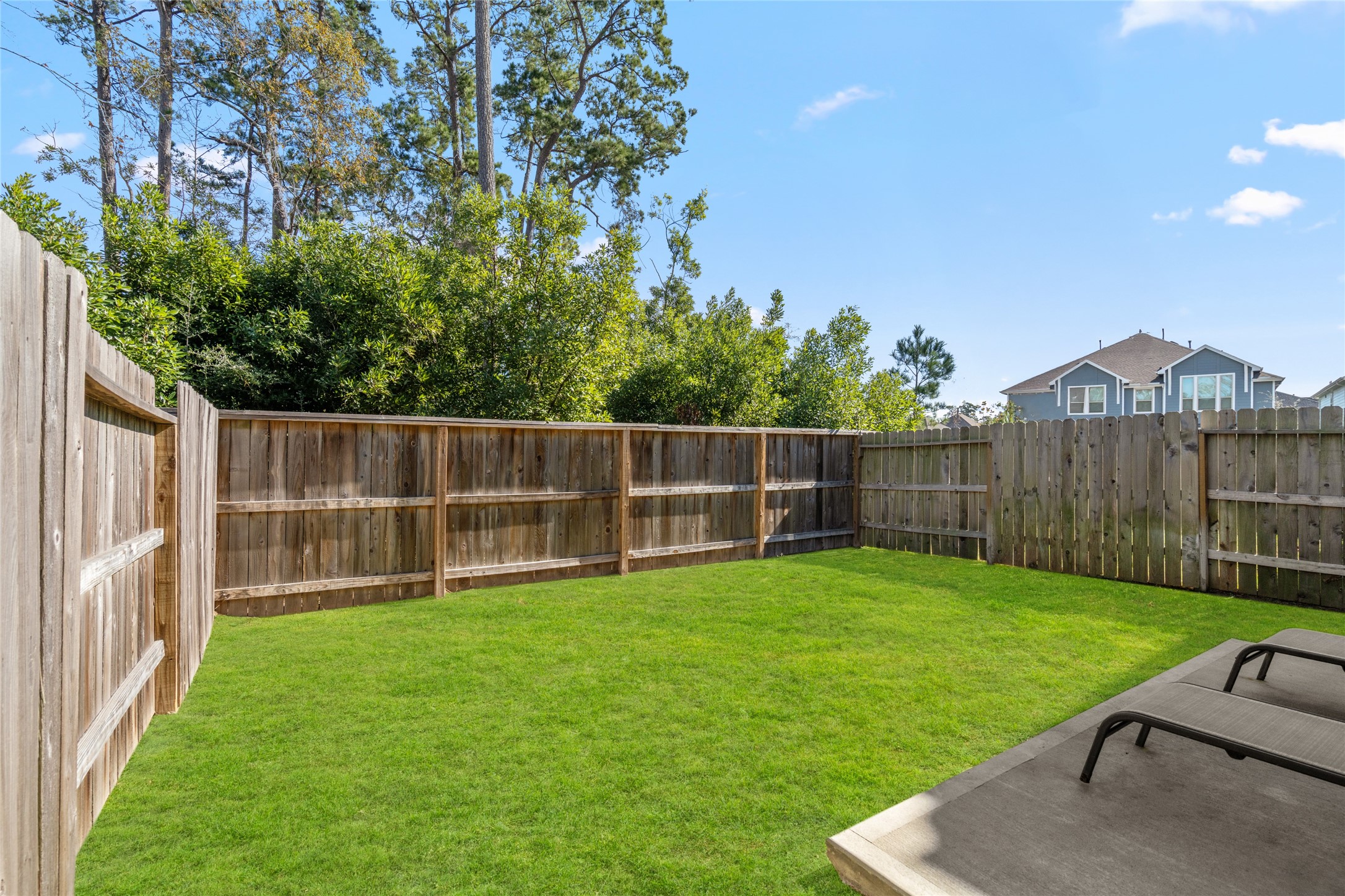 575 Dry Fork Lane Conroe, TX 77304 - Photo 27 of 34 a view of a backyard with a garden