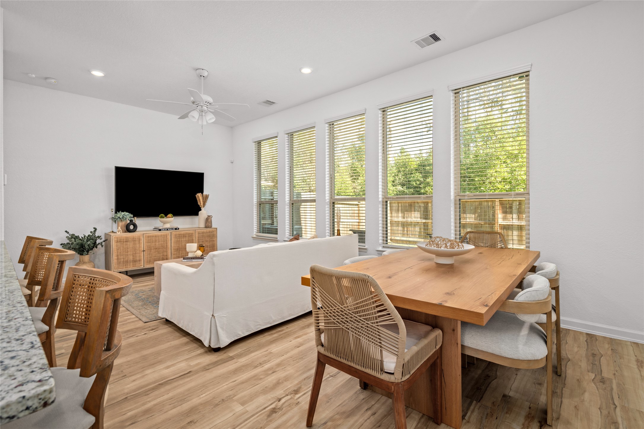 575 Dry Fork Lane Conroe, TX 77304 - Photo 3 of 34 a living room with furniture and a flat screen tv