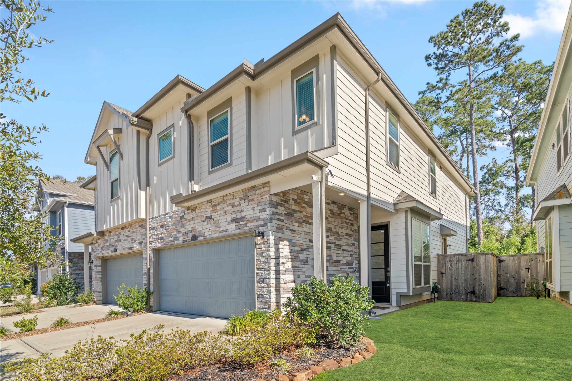 575 Dry Fork Lane Conroe, TX 77304 - Photo 32 of 34 a view of a house with a yard