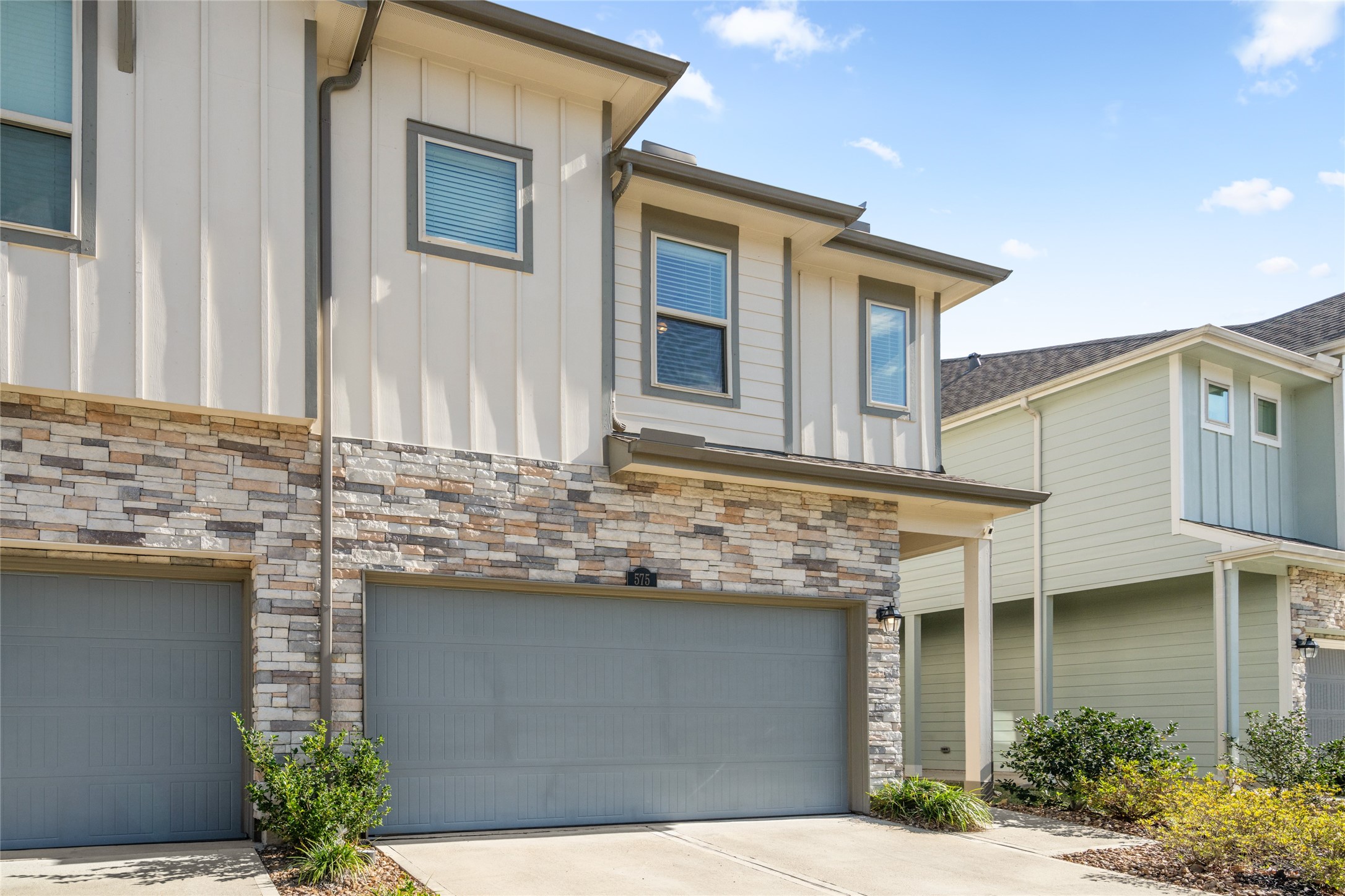 575 Dry Fork Lane Conroe, TX 77304 - Photo 33 of 34 a view of a house with a potted plant