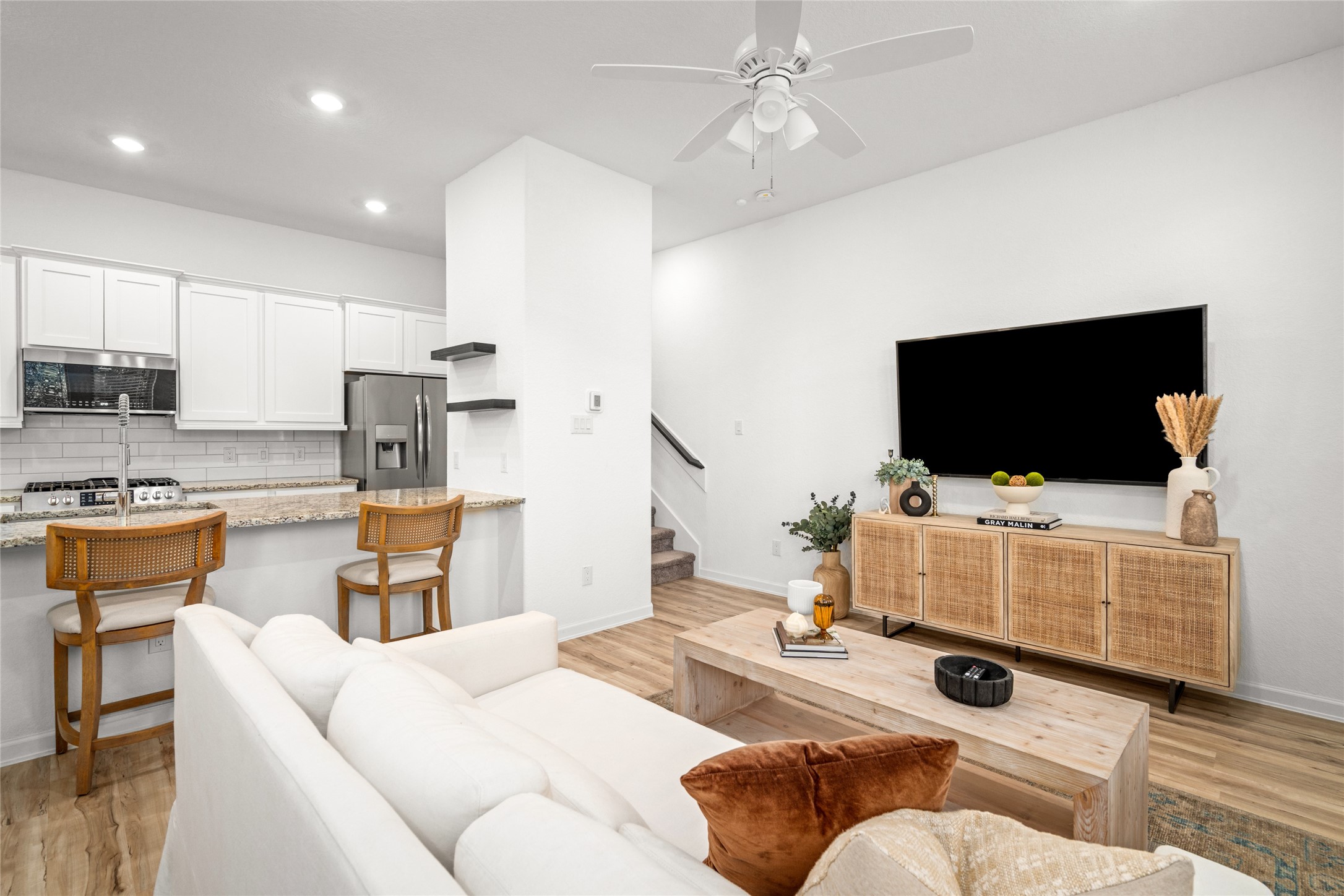 575 Dry Fork Lane Conroe, TX 77304 - Photo 4 of 34 a living room with furniture and a flat screen tv