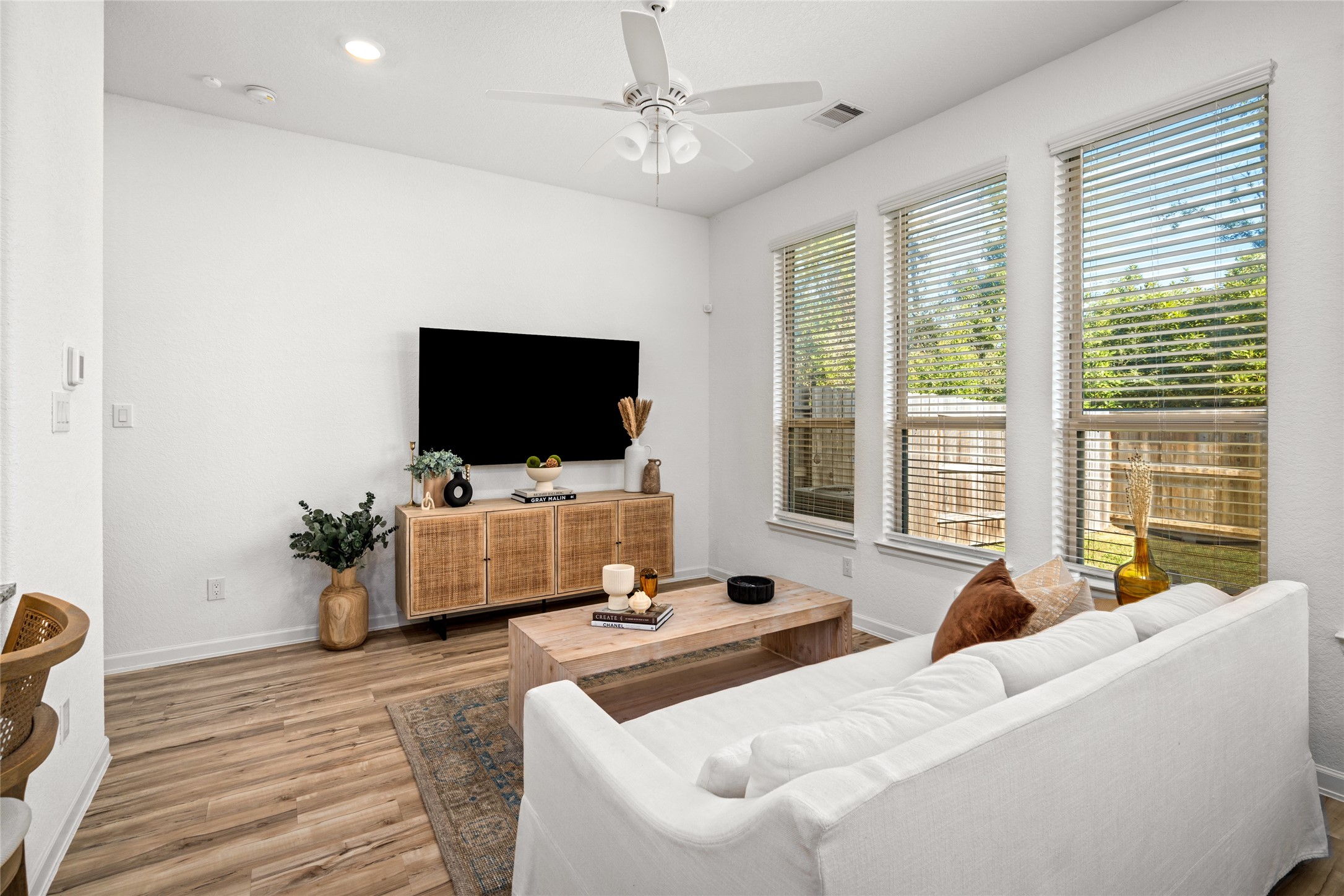 575 Dry Fork Lane Conroe, TX 77304 - Photo 10 of 34 a living room with furniture and a flat screen tv