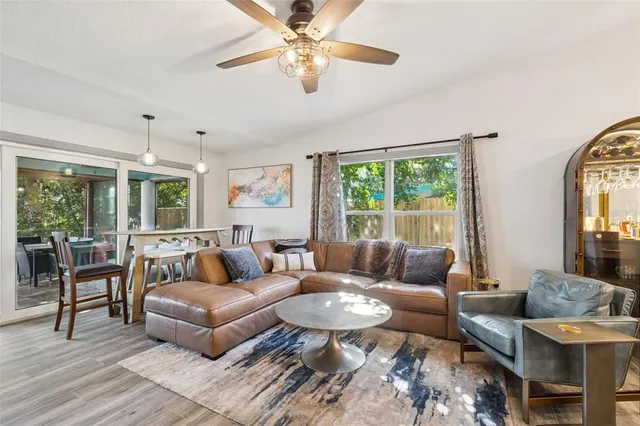 a living room with furniture and a window