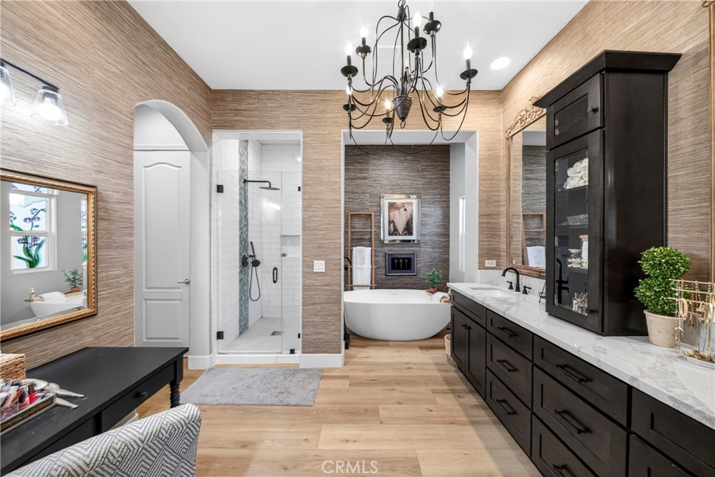16375 Ory Circle Riverside, CA 92503 - Photo 27 of 51 a spacious bathroom with a granite countertop tub and a large mirror