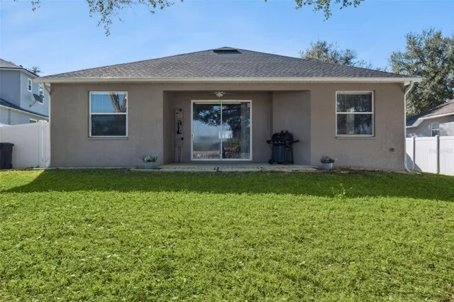 a front view of house with yard