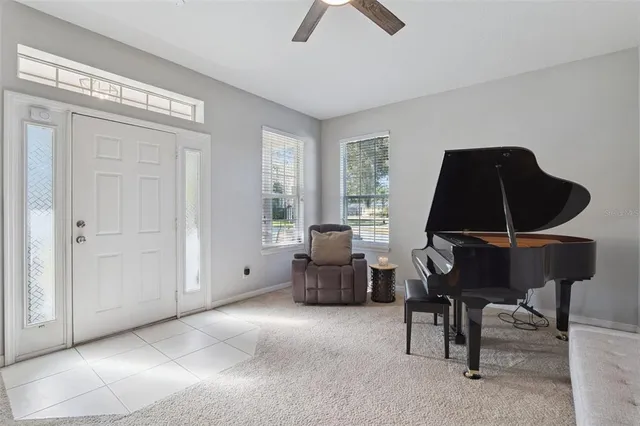 a living room with furniture and a window